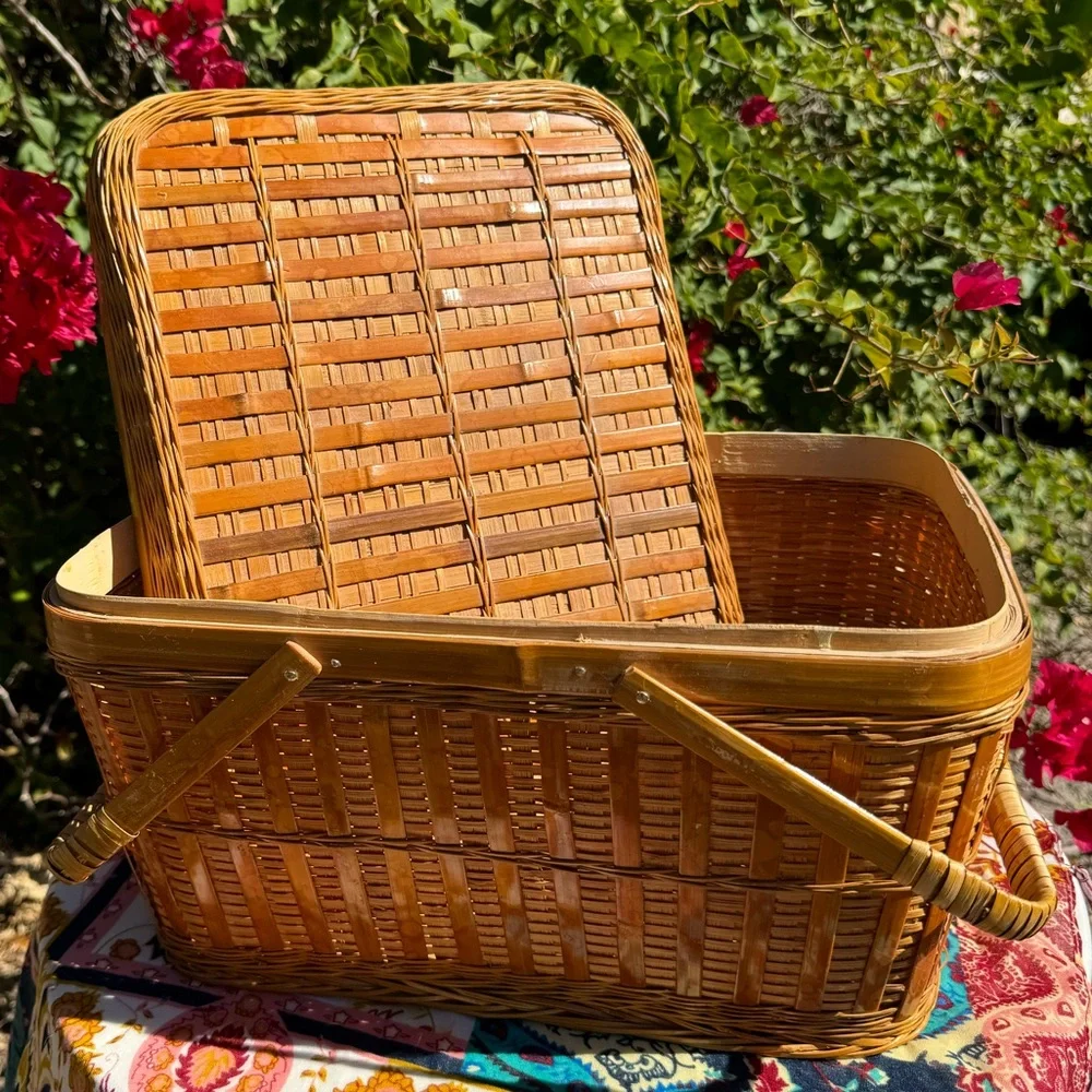Large Vintage Handmade tan rattan picnic basket with handles.